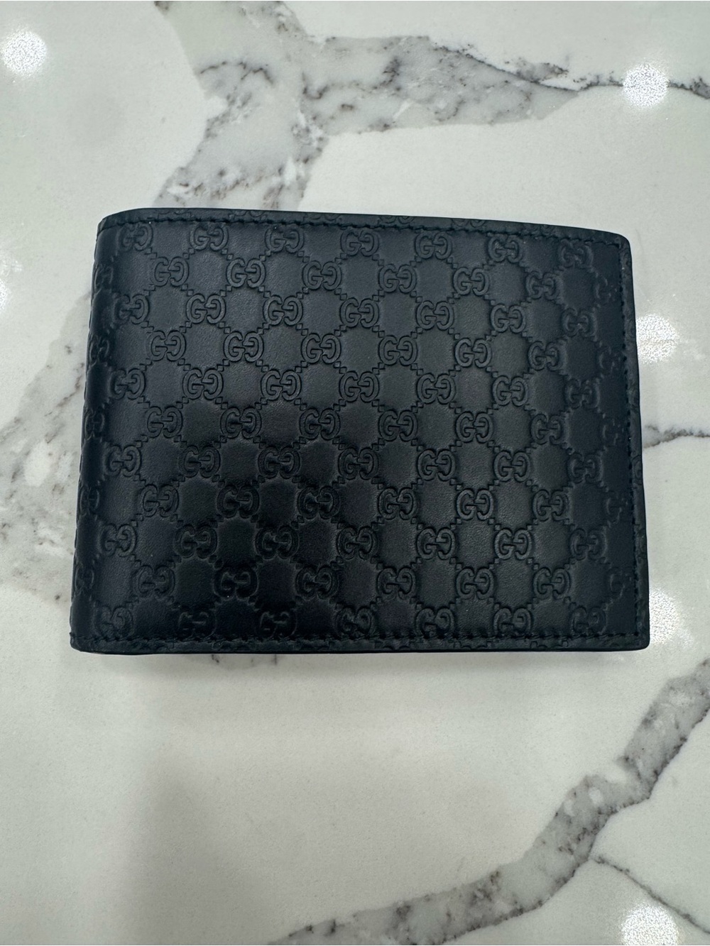 Gucci Black Embossed GG Leather Wallet